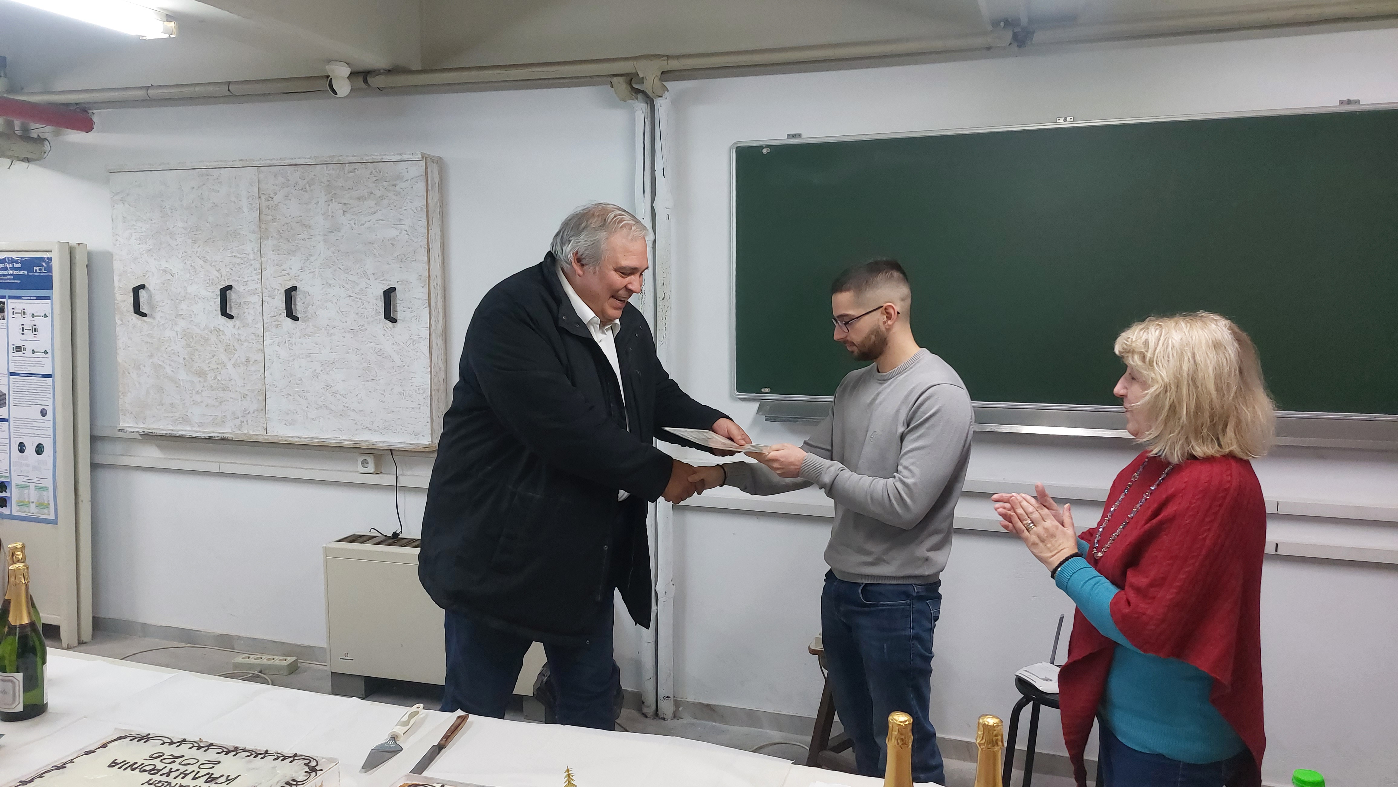 Prof. Vasilios Spitas presenting the third Michael Sfantzikopoulos Award to Athanasios Akrivosi