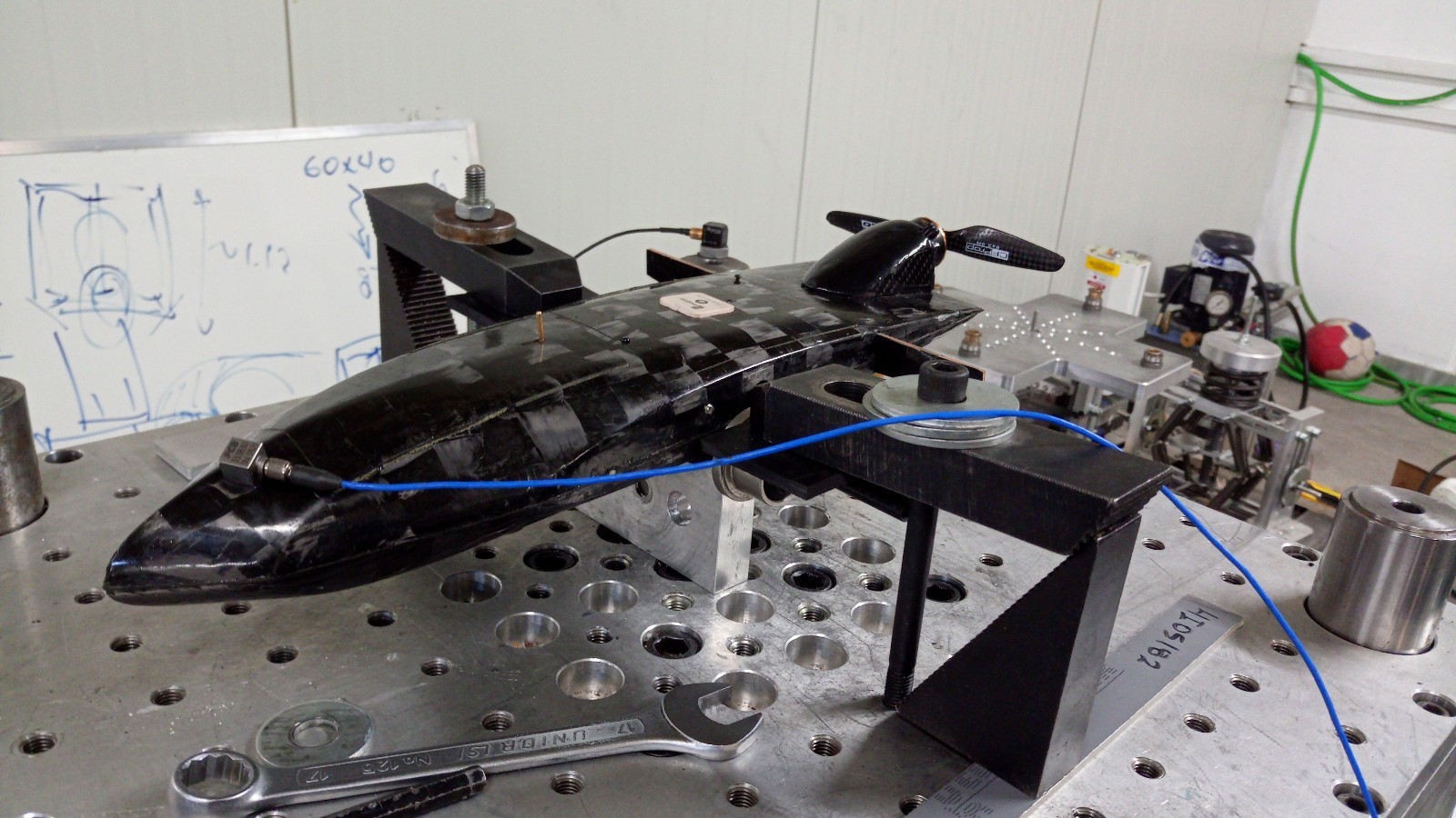 UAV prototype mounted on the DERRITRON vibration system during dynamic testing