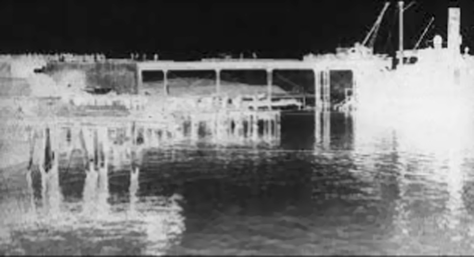 Historical photograph of the French Wharf of Lavrion during crane operation