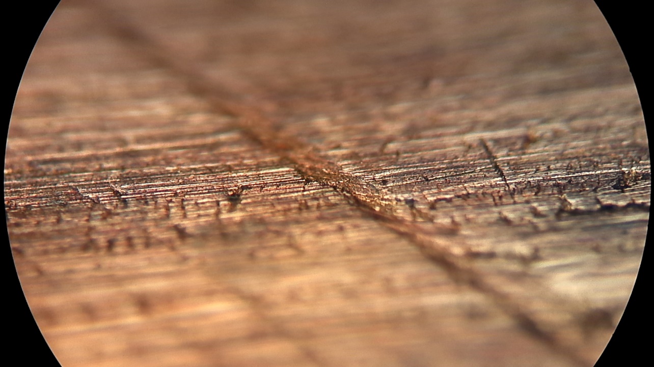 Microscope image of a Luder line failure feature on a copper tube specimen