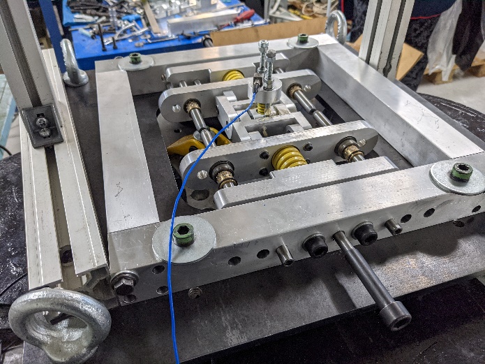 Detail of a NOESIS KDamper prototype on the test bench