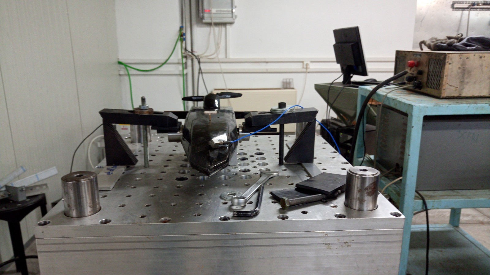 UAV fuselage assembly mounted on the DERRITRON exciter for dynamic response testing