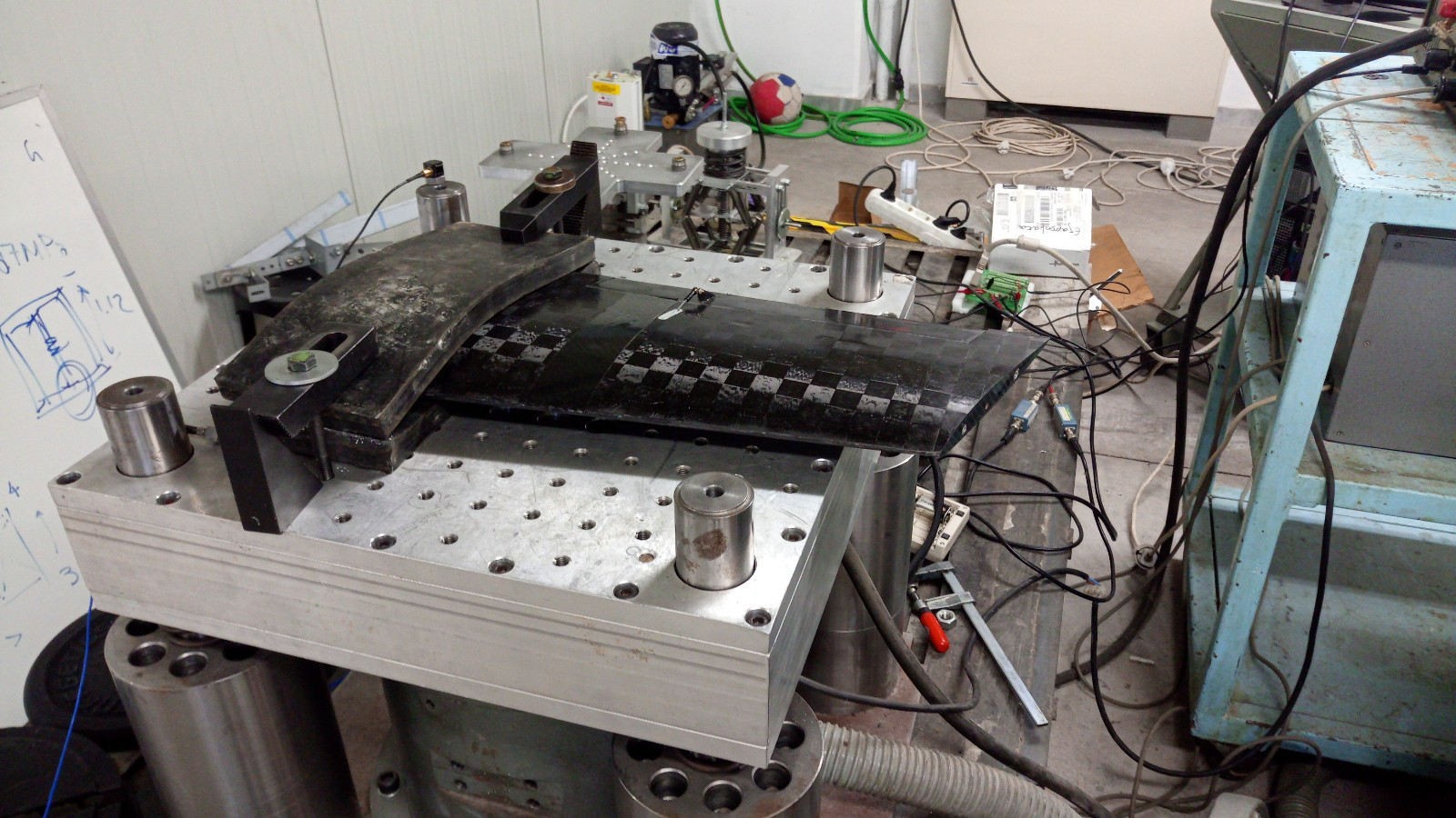 UAV wing assembly mounted for vibration testing on the DERRITRON system